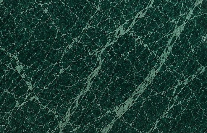 Udaipur Green marble: deep emerald surface crossed by fine pale green and white veins